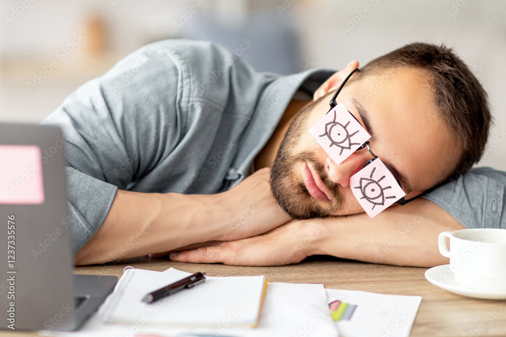 Aufkleber lazy unproductive young guy wearing funny sticky notes with open eyes on his glasses, sleeping at wo