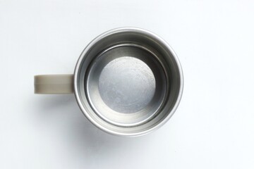 metal cup on white background