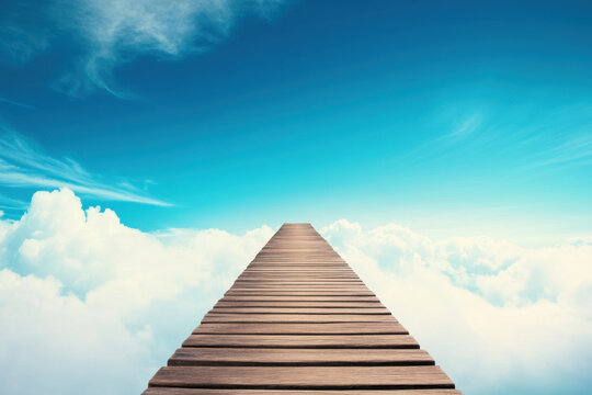 wooden pathway leads into bright blue sky filled with fluffy white clouds, evoking sense of tranquility and wonder