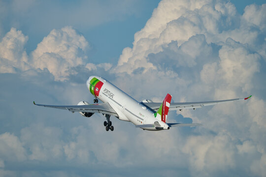 TAP Air Portugal Airbus A330-941 passenger plane in sky after take off in Humberto Delgado Airport in Lisbon