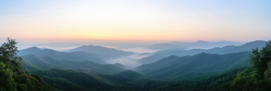 Sunrise illuminating misty mountain ranges in great smoky mountains national park