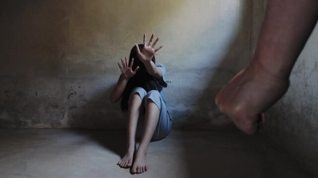 Campaign against human trafficking. Young woman raised her hand telling her to stop domestic violence. Human rights violations.