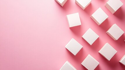 White boxes arranged on a pink background