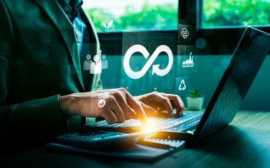 Businessman Working on Circular Economy Strategy with Digital Interface Showing Sustainability, Recycling, Renewable Energy, and Carbon Reduction Icons for Green Innovation