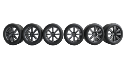 Six car tires standing in a row on transparent background