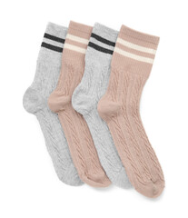 Different soft socks isolated on white, top view