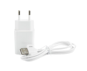 USB power adapter and charge cable isolated on white