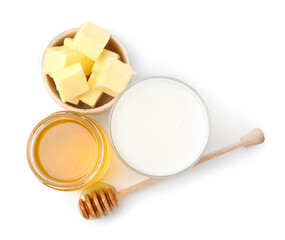 Sweet honey, butter and milk isolated on white, top view