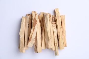 Palo santo sticks on white background, top view