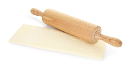 Fresh dough and rolling pin isolated on white