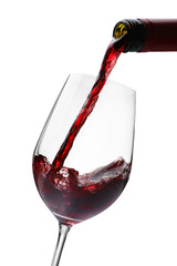 Pouring red wine into glass isolated on white