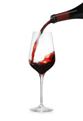 Pouring wine into glass on white background