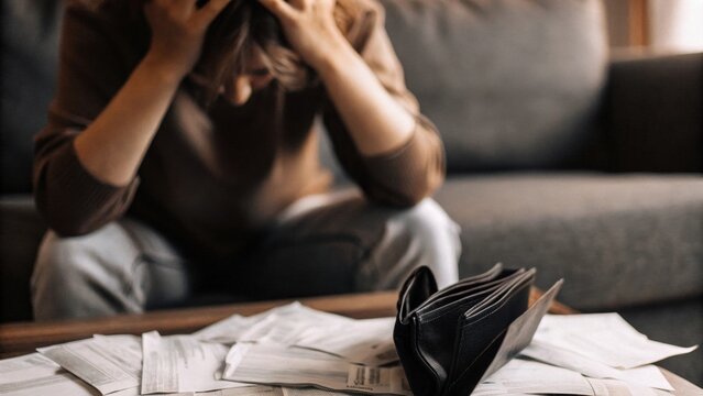 Insecurity money, Stressing with Finance and Debt. Stressful financial situation depicting anxiety related to money management and debt issues in a close-up view.