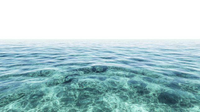 Calm transparent water surface gently flowing over a colorful coral reef in a sunny day