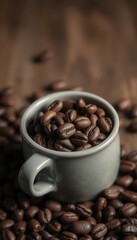 Fototapeta premium Coffee cup filled with roasted beans on a rustic wooden background.