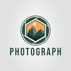 Mountain landscape within camera aperture for photography branding design. Suitable for website backgrounds, promotional materials, and photography related projects.