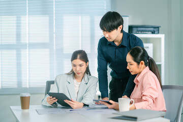 A business people and Startup marketing team, Smiling businesspeople having a discussion in an office. Teamwork, Strategy, Team Brainstorming Strategy Development for Corporate Growth Session