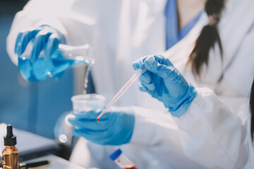 Microbiological research with a test tube and micropipette in close -up