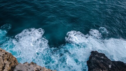 Fototapeta premium Aerial View of Ocean Waves Crashing Against Rocky Cliff Edges : Generative AI