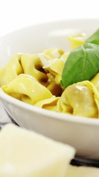 Bowl of cooked pasta with cheese
