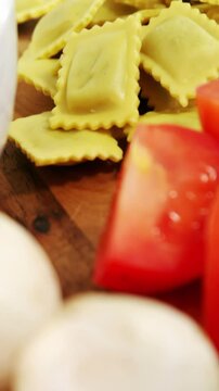 Raw pasta with ingredients