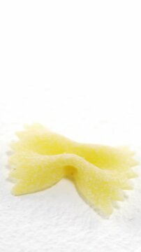 Various pasta on white background