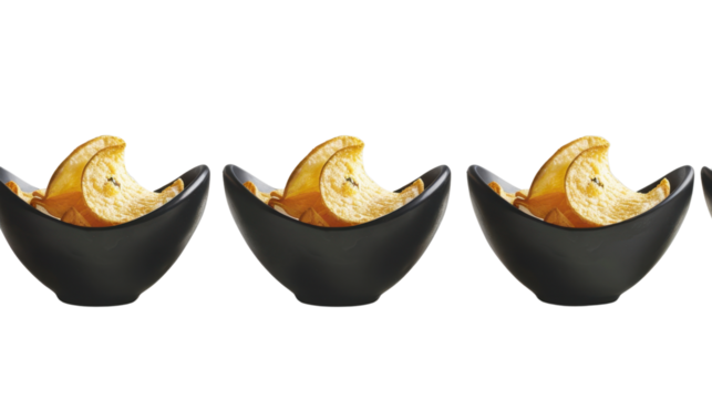 Banana chips overflowing three black bowls on transparent background