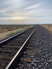 Railway in the middle of the dessert against the blue sky in Lancaster, CA