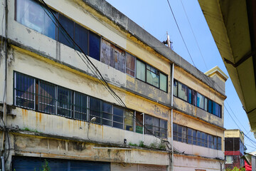 A collection of various exterior windows on buildings, showcasing diverse architectural styles and...