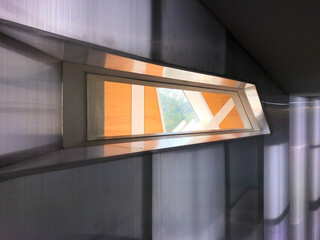 A collection of various exterior windows on buildings, showcasing diverse architectural styles and materials.