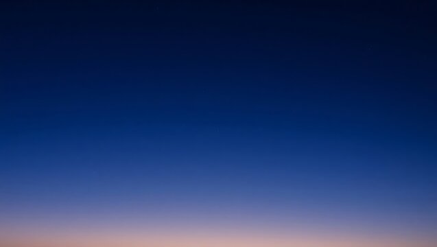 Stunning deep blue gradient sky with a smooth transition into night for dramatic visual designs