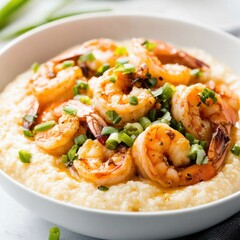 A scrumptious bowl of shrimp and grits with tender shrimp, creamy grits, and a sprinkle of green onions