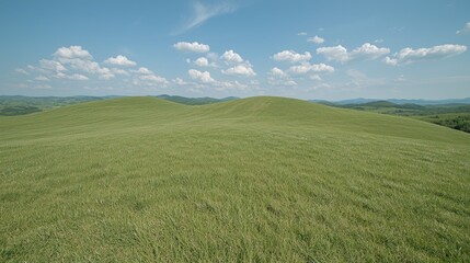 Obraz premium Sunny day, rolling green hills, blue sky, clouds. Landscape photography for travel brochures