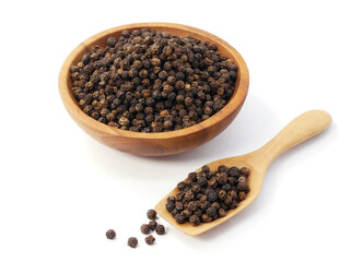 Black pepper in wooden spoon with bowl isolated on white background