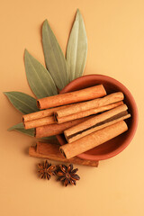Cinnamon sticks ,dry bay leaf  & star anise  in traditional earthen bowl