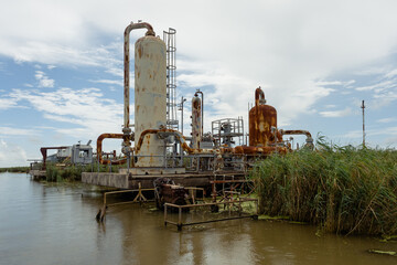 Obraz premium Oil and gas infrastructure in the Mississippi River Delta, Plaquemines Parish, Louisiana, USA 