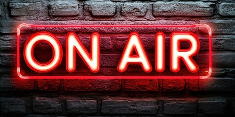 A glowing red neon "ON AIR" sign on a dark brick wall, symbolizing live broadcasting, streaming, and radio shows.