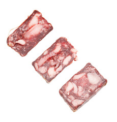Three pieces of meat are cut into small squares