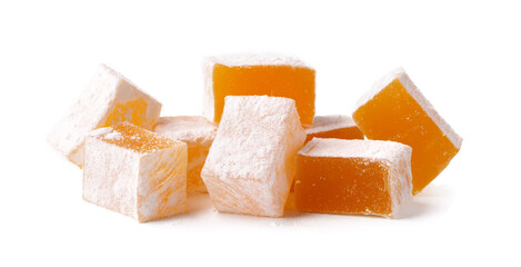 Delightful assortment of yellow Turkish delight dusted with powdered sugar on a white background