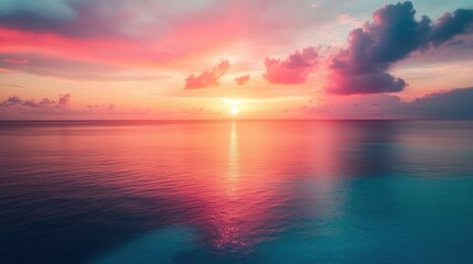 Naklejka premium stunning pink and teal ocean sunset