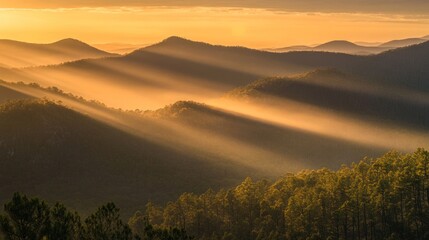Golden Rays of Sunrise over Majestic Mountains