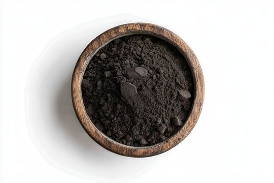 Black maca organic powder pile in cly pot isolated on white background