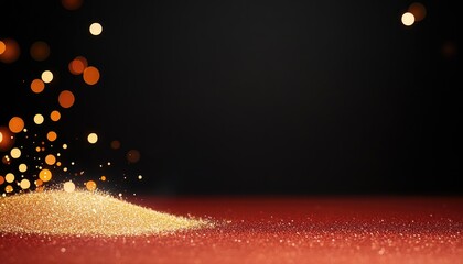 Glimmering golden sand pile on a vibrant red surface with bokeh lights in the background