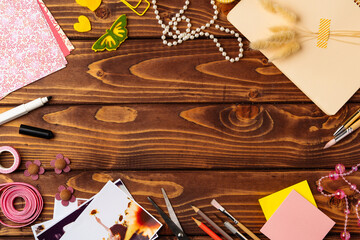 Crafting fun at a creative workspace with colorful materials on a wooden table