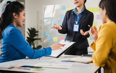Female business leaders come together in conference room for their annual meeting, actively participating, asking questions, enriching  seminar, Asian people, only women, Proposals and comments.
