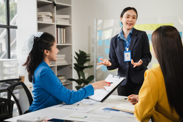 Female business leaders come together in conference room for their annual meeting, actively participating, asking questions, enriching  seminar, Asian people, only women, Proposals and comments.