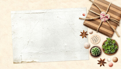 Eco-friendly background with objects from recycled material. Gift box wrapped in organic paper, wood beads, cactus and succulents in pot. Home garden, hobby and leisure concept. Copy space for text