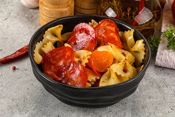 Italian pasta farfalle with pepperoni
