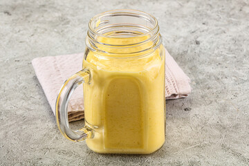 Cold sweet mango smoothie glass