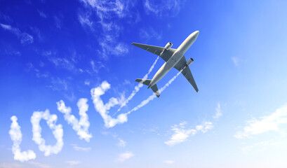 Blue sky with aircraft and Jet trailing smoke. Airplane drawing a word love in sky. Concept of love of travelling. Topic of summer vacation, travel, trip abroad on vacation, cruises and tours